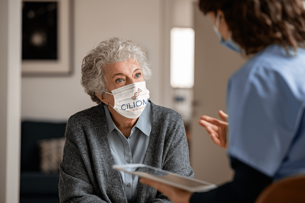 face mask mockup of an elderly woman getting medical attention 45012 r el2